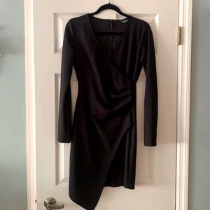 Black form fitting dress with long sleeves